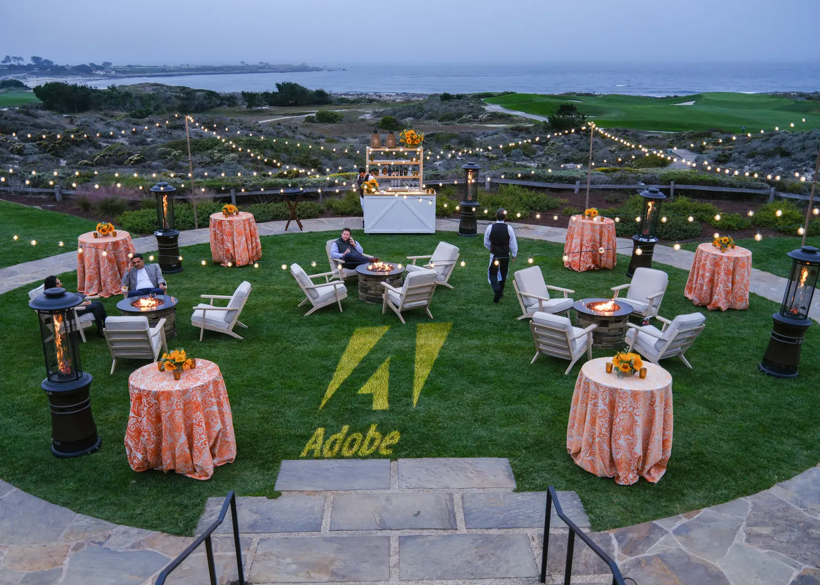 Adobe corporate dinner at Inn at Spanish Bay with fire pits and ocean views, photographed by Manny Espinoza