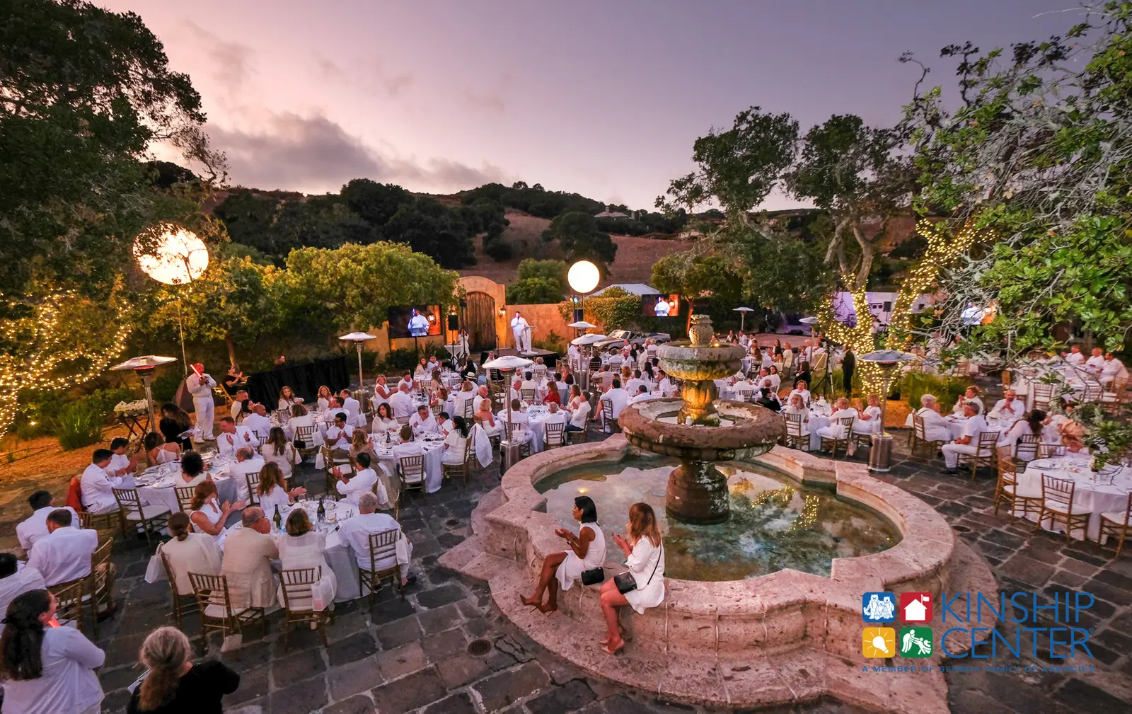 Evening gala under market lights at a Monterey Peninsula estate, photographed by Manny Espinoza