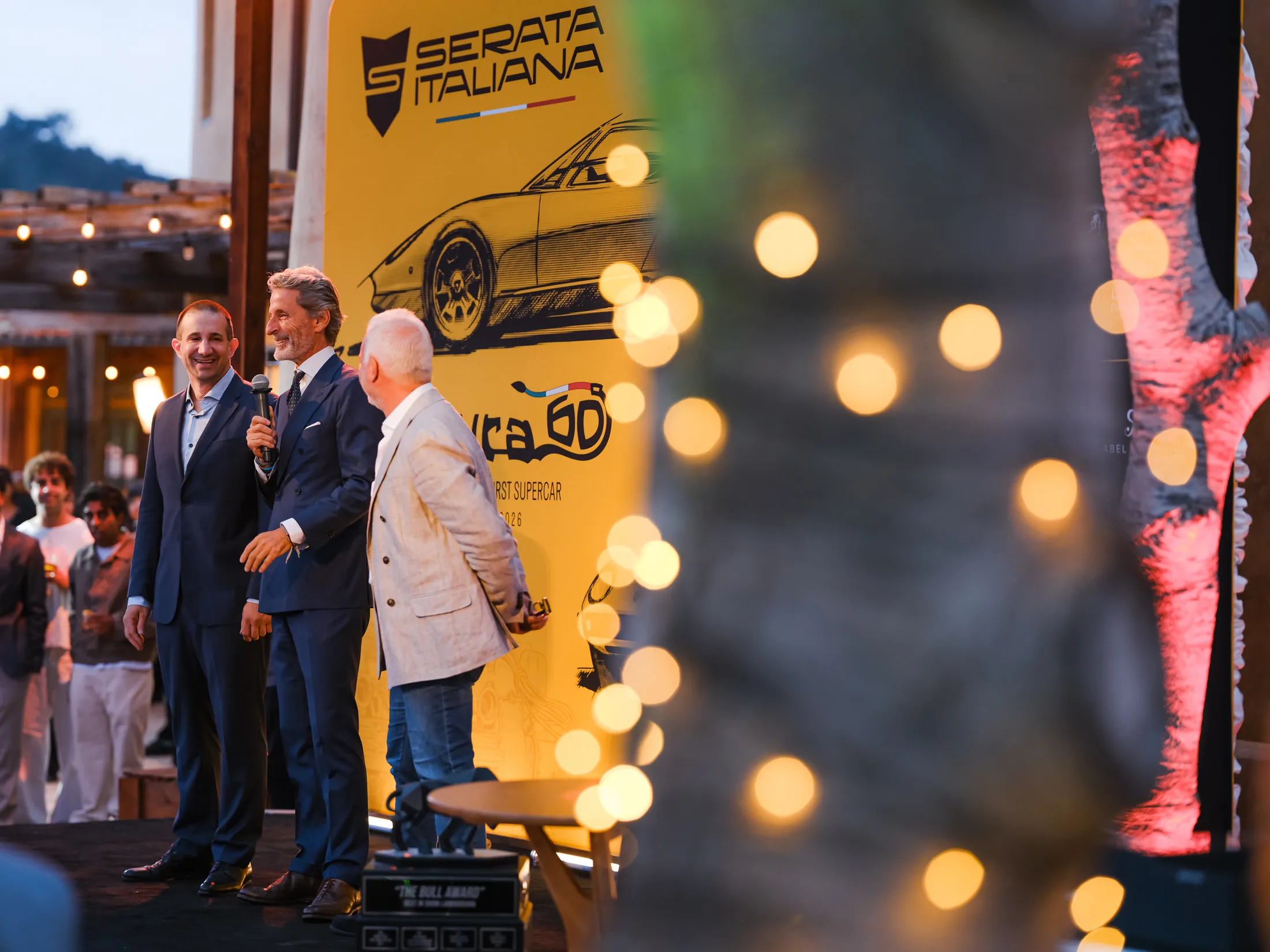 Speakers on stage at the Lamborghini Serata Italiana Miura 60 celebration at TPC Pasadera during Monterey Car Week