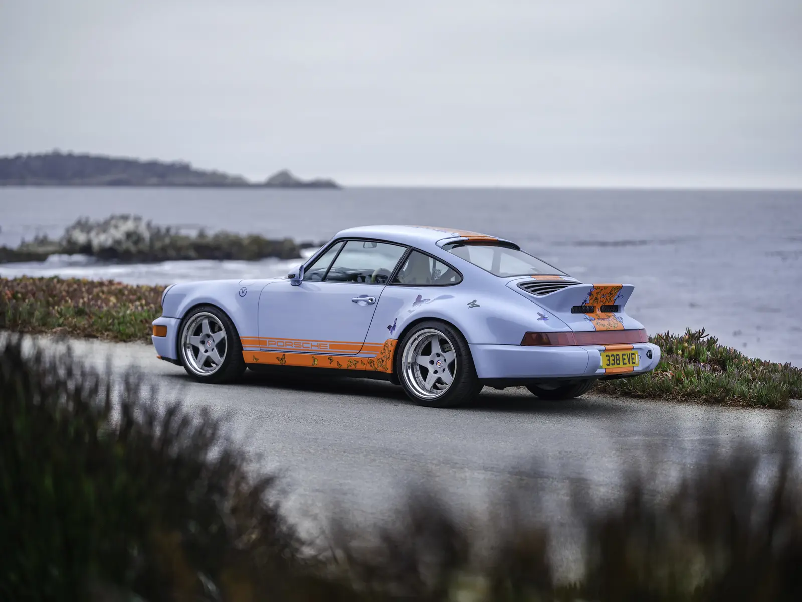 Electric restomod Porsche 911 on the Monterey coast during Car Week, photographed by Manny Espinoza