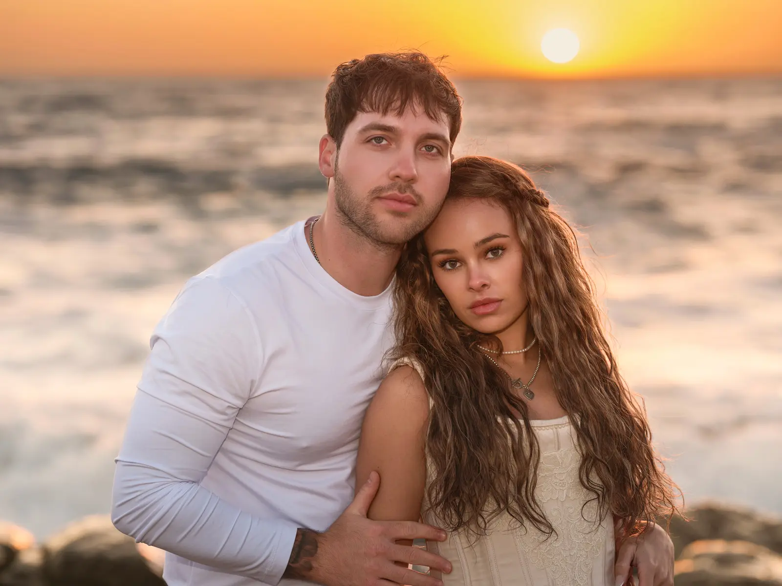 Couple portrait at sunset during a Ribera Beach proposal session in Carmel