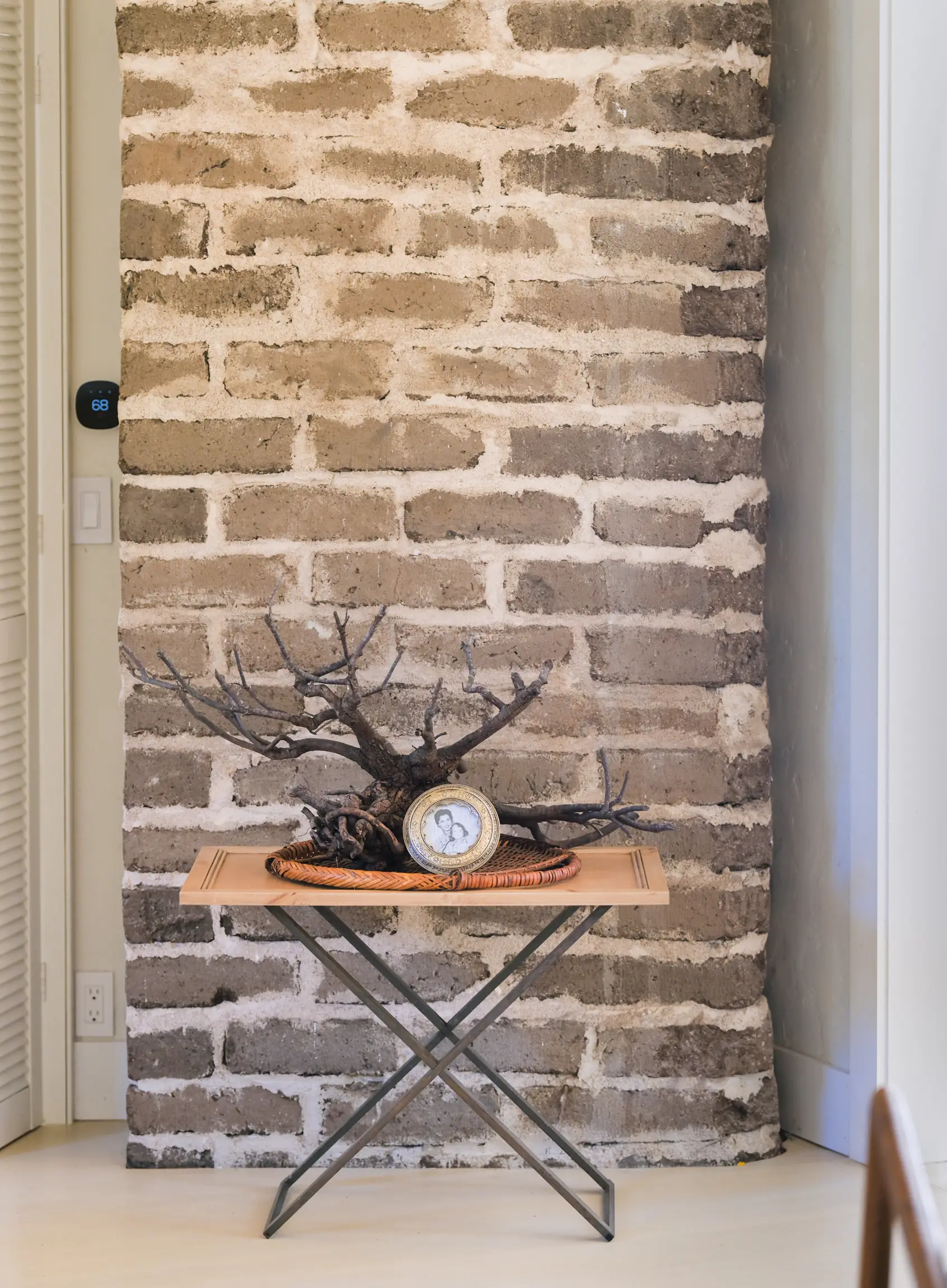 Exposed adobe brick wall detail inside 150 Littlefield Road, Monterey