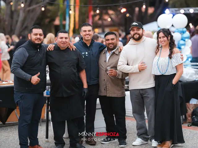 Chefs and event staff posing together at Taste of Carmel 2026