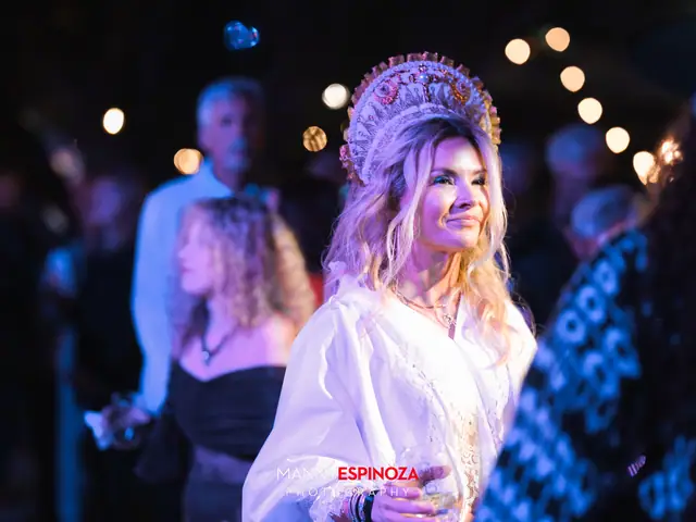 Woman in an ornate white headdress and ruffled blouse at Taste of Carmel 2026