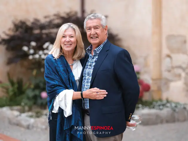 Guests posing for a portrait in the Carmel Mission courtyard at golden hour at Taste of Carmel 2026