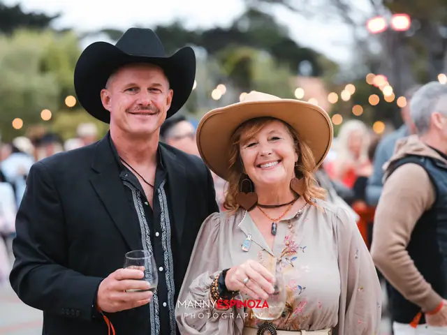 Couple in cowboy hats at Taste of Carmel 2026