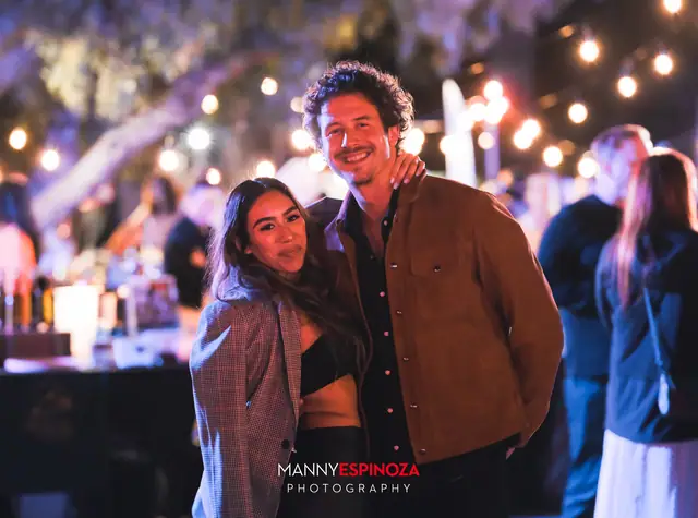 Couple posing among string lights at Taste of Carmel 2026