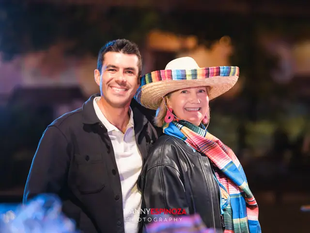 Couple in a striped serape and sombrero at Taste of Carmel 2026