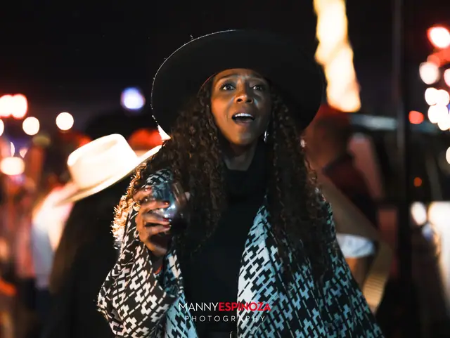 Guest in a wide-brimmed black hat at Taste of Carmel 2026