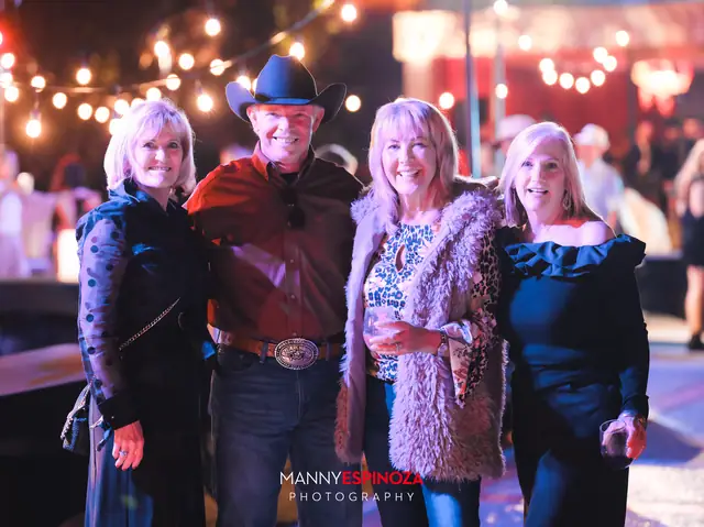 Four guests in western wear posing at Taste of Carmel 2026