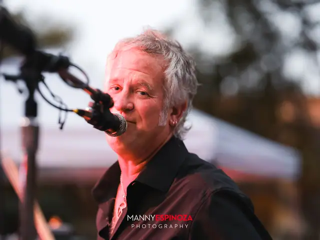 Vocalist at the microphone on stage at Taste of Carmel 2026