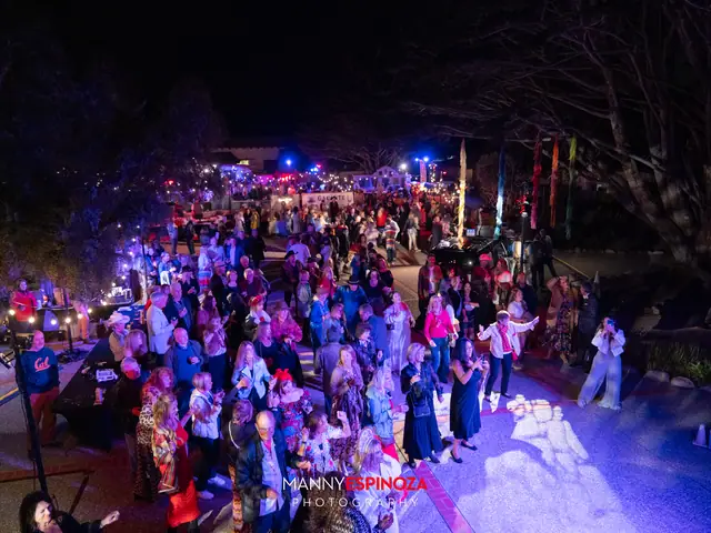 Elevated view of the packed Carmel Mission courtyard at night during Taste of Carmel 2026