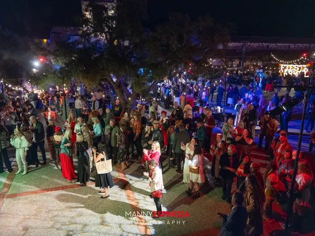 Elevated view of the packed Carmel Mission courtyard at night during Taste of Carmel 2026