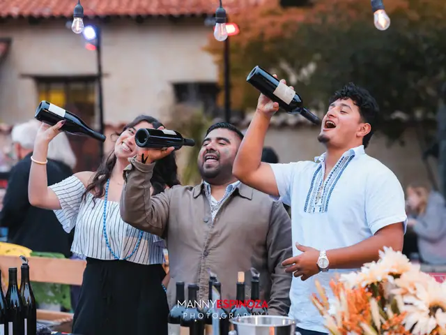 Three people from a winery pouring bottles at Taste of Carmel 2026