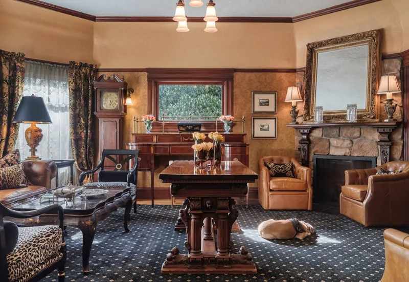 Parlor with fireplace at The Charles, Napa Valley, hotel common area photography