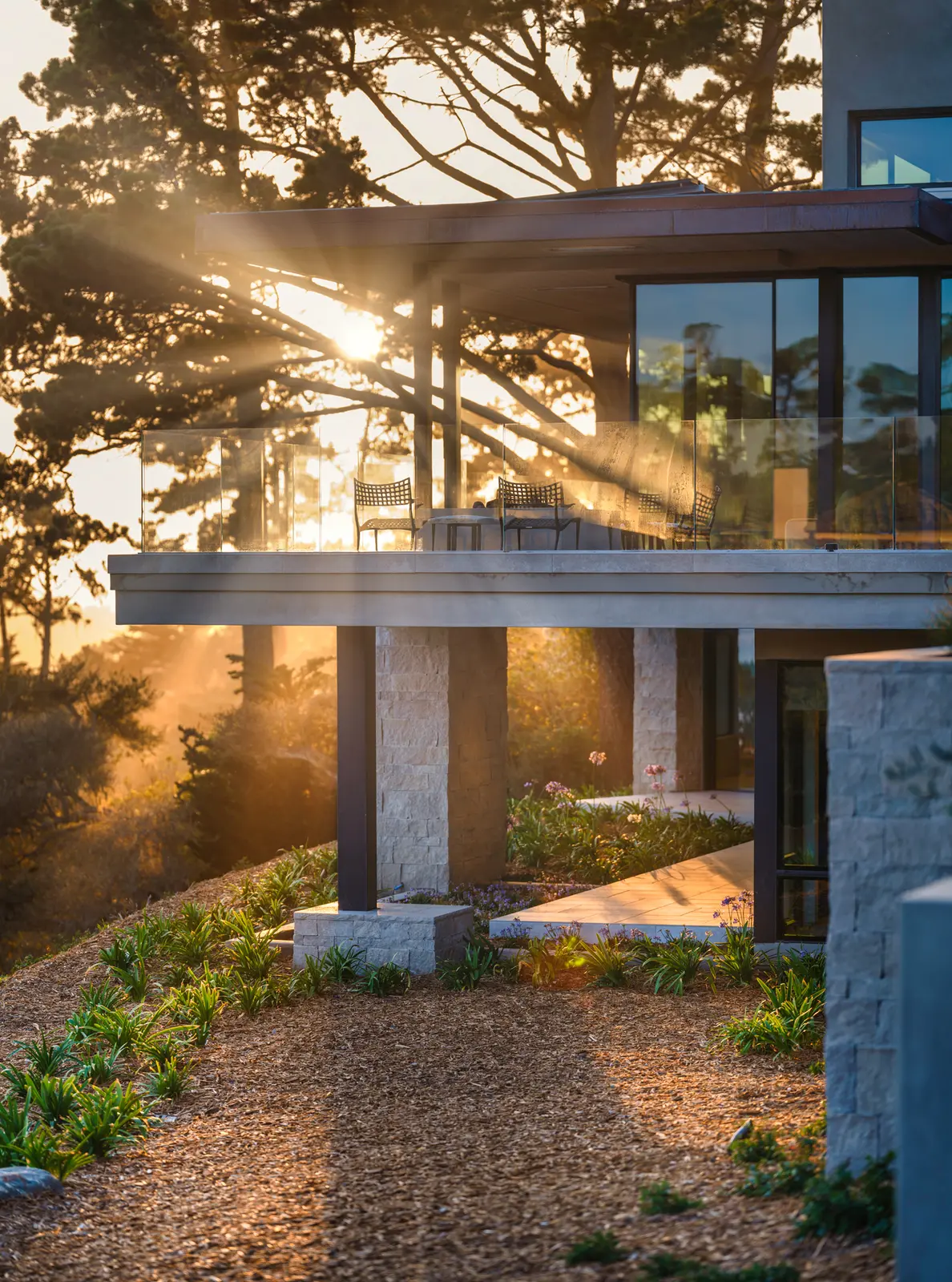The Edge, a Sterling Huddleson–designed Pebble Beach residence — architectural detail at sunset